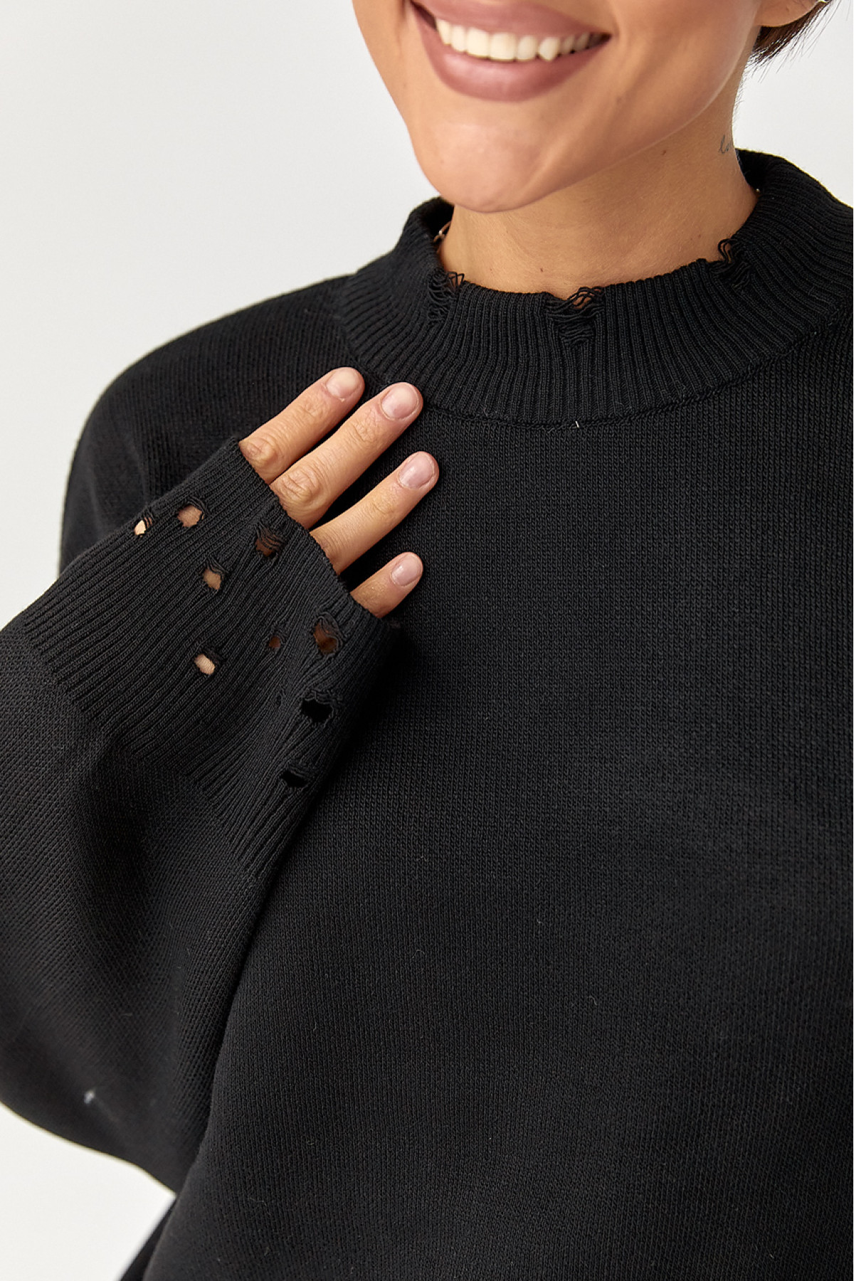 Трикотажний костюм з рваним ефектом  чорний колір