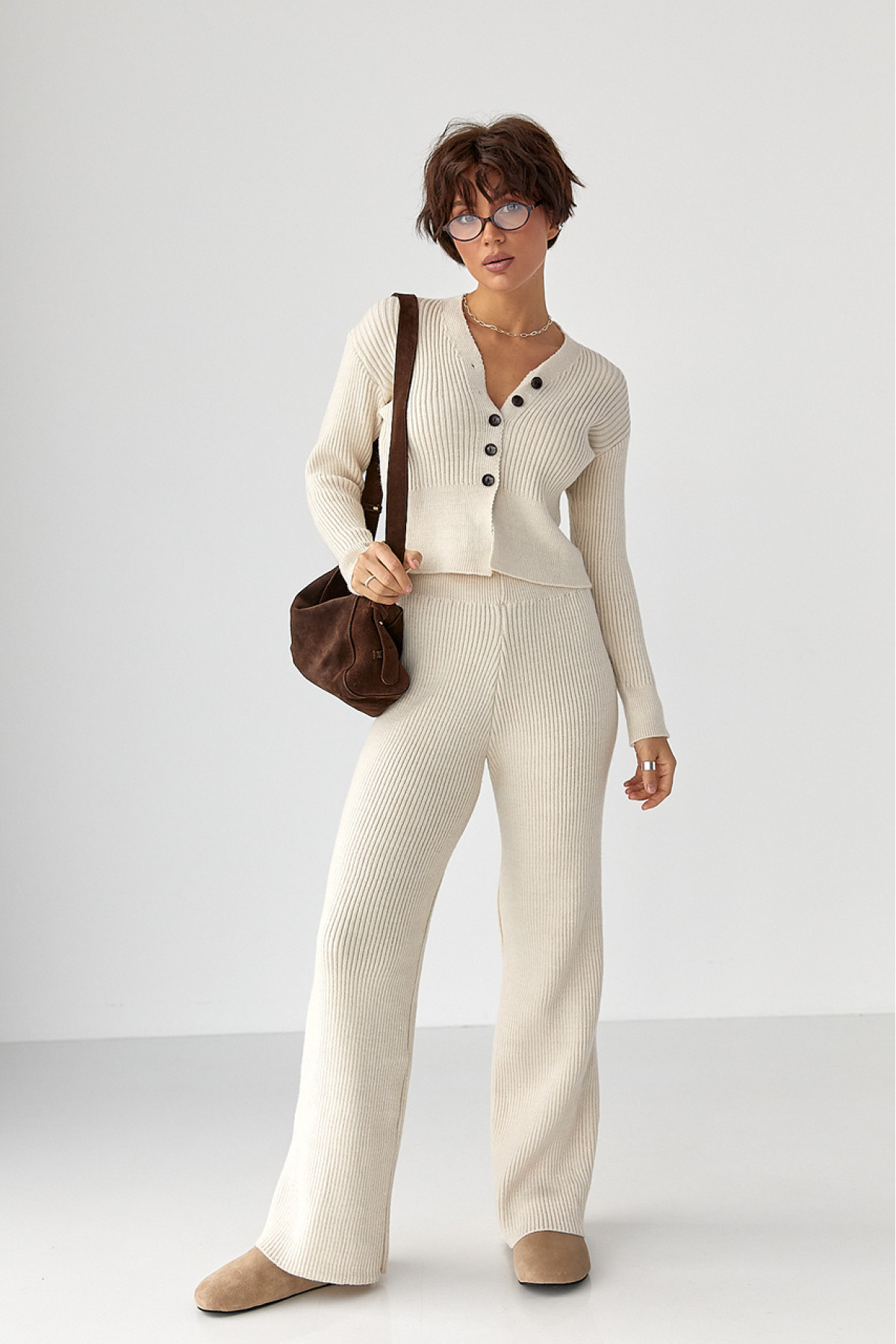 Трикотажний костюм у рубчик із кардиганом і штанами палаццо  молочний колір