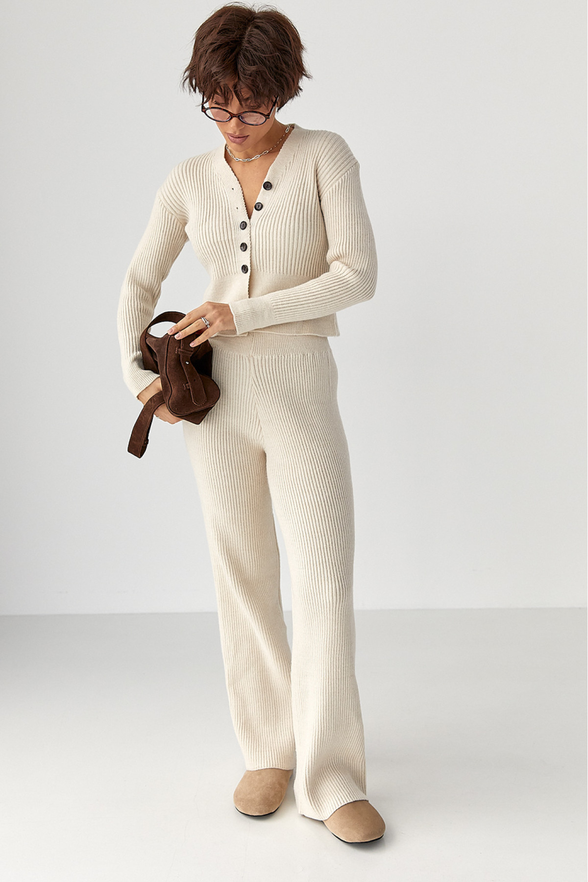 Трикотажний костюм у рубчик із кардиганом і штанами палаццо  молочний колір