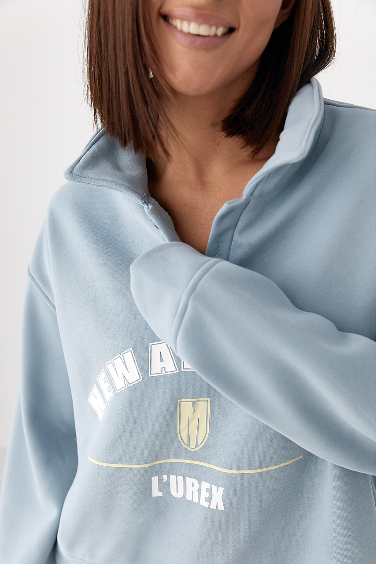 Утеплений світшотполо з ґудзиками  блакитний колір