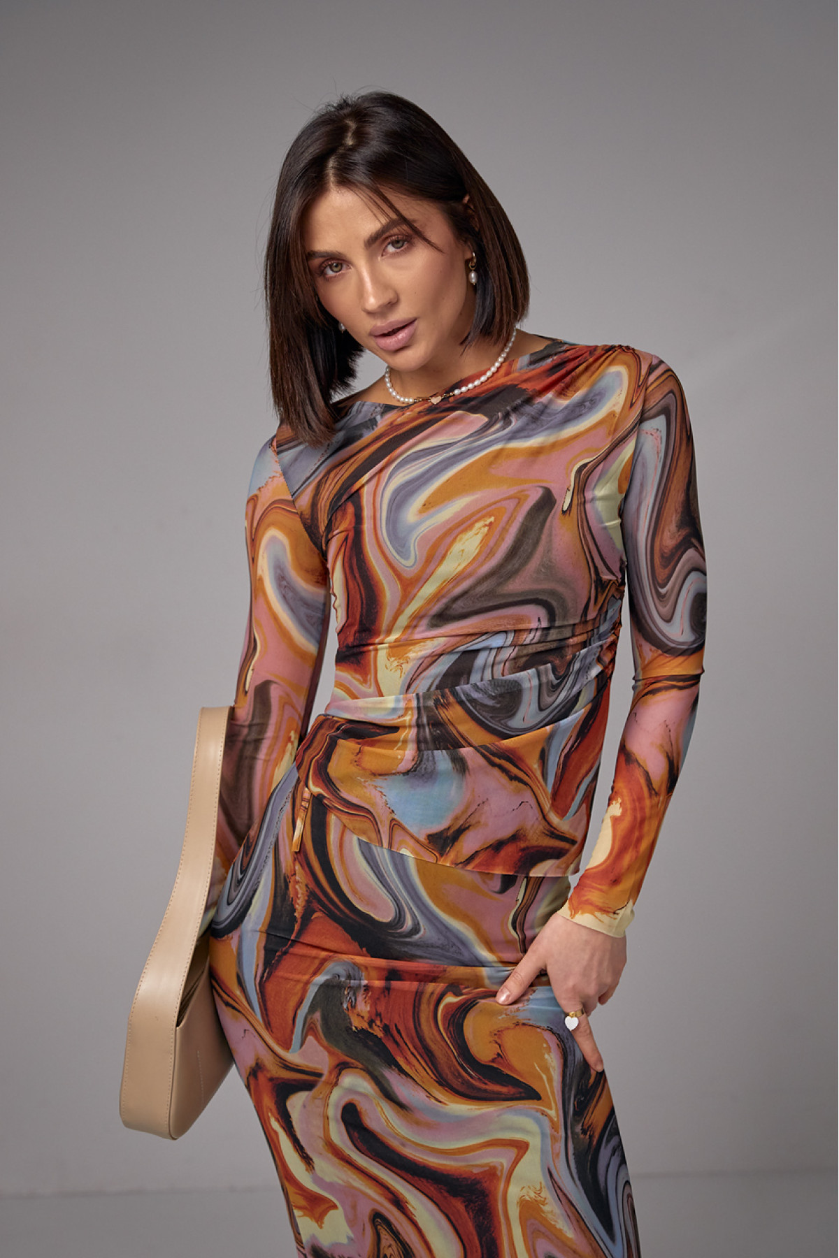 Костюм зі спідницеюміді та джемпером із сітки  теракотовий колір