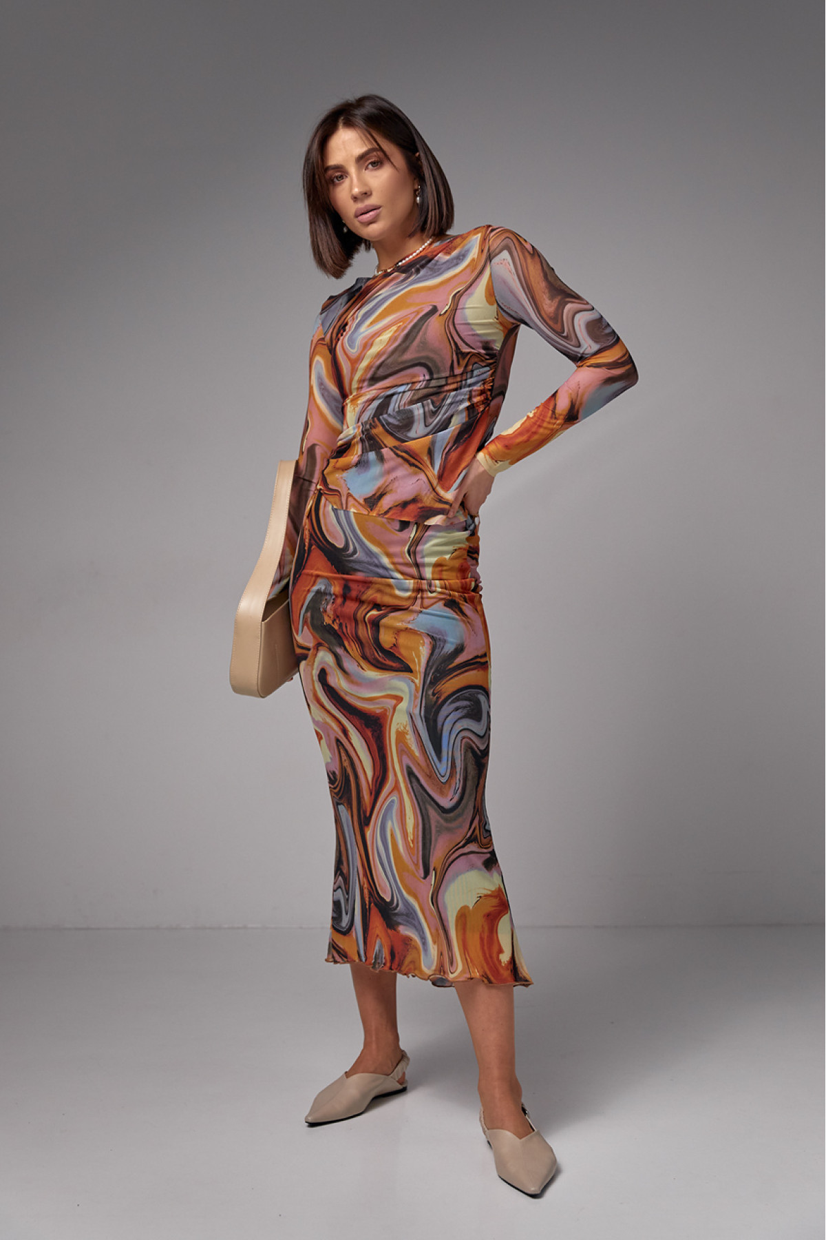 Костюм зі спідницеюміді та джемпером із сітки  теракотовий колір