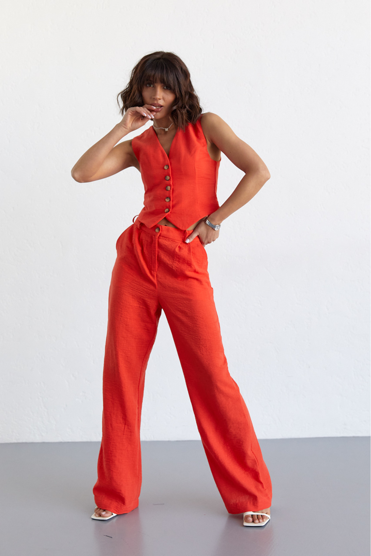 Жіночий брючний костюм із жилеткою  помаранчевий колір