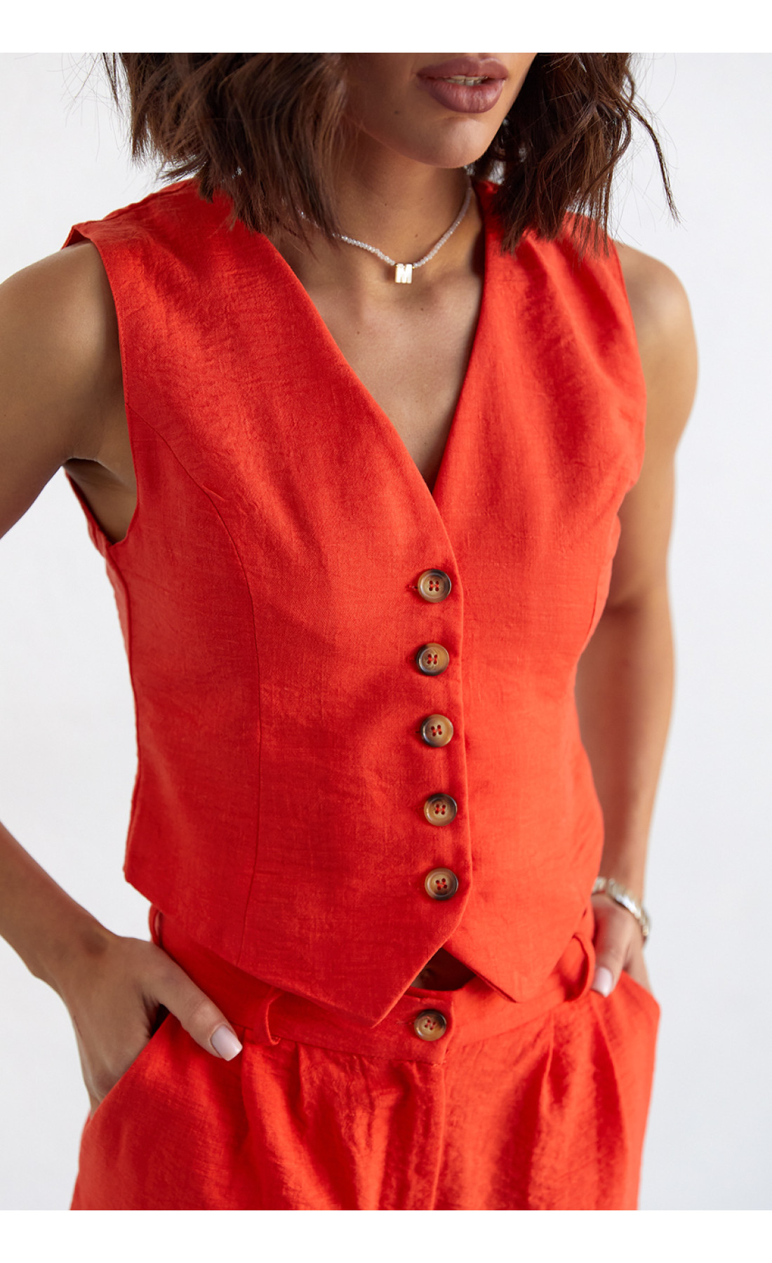 Жіночий брючний костюм із жилеткою  помаранчевий колір