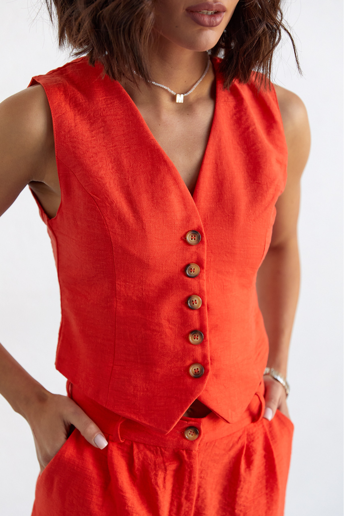 Жіночий брючний костюм із жилеткою  помаранчевий колір