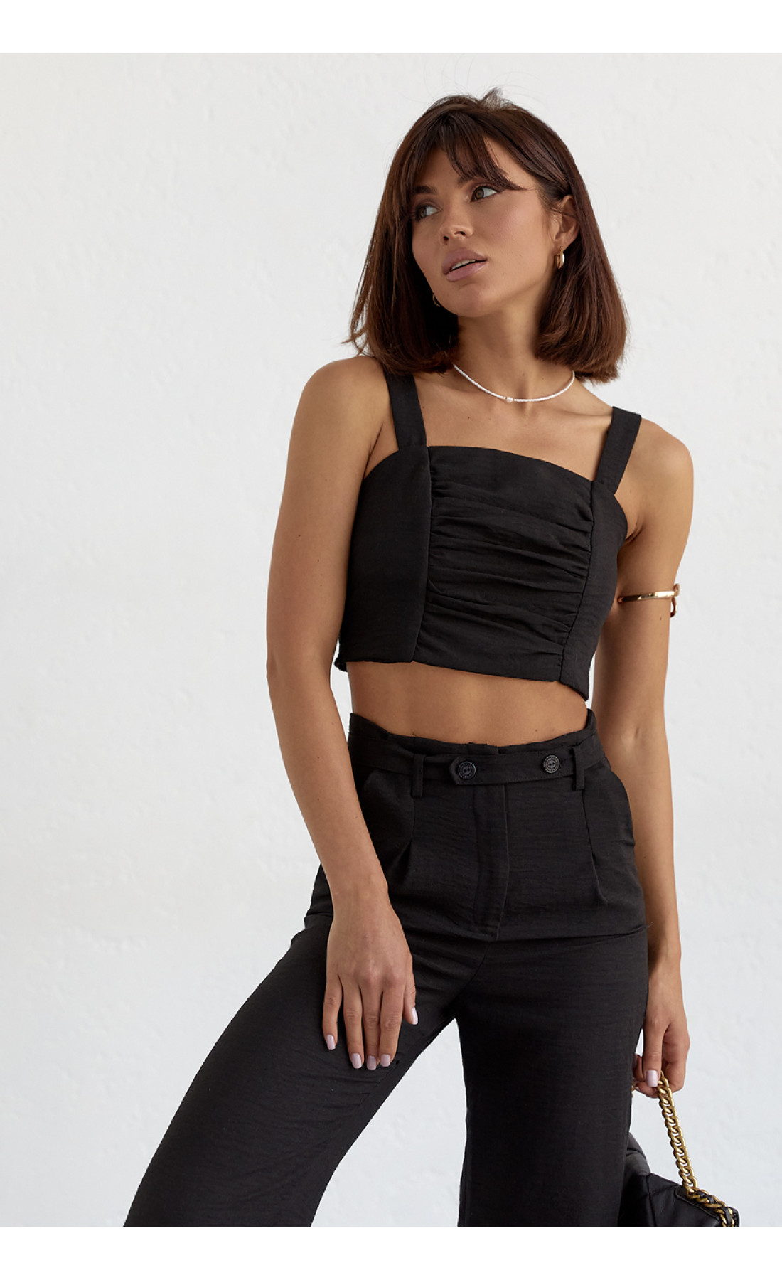 Жіночий бавовняний костюм із брюками та топом  чорний колір