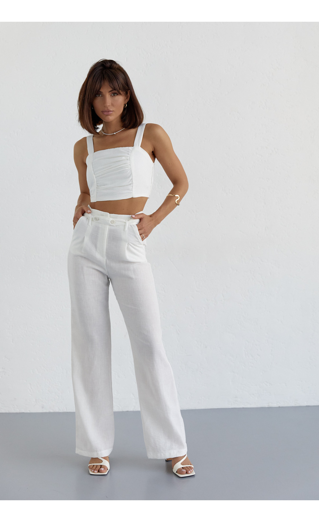 Жіночий бавовняний костюм із брюками та топом  молочний колір