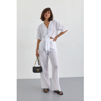 Жіночий літній костюм із брюками та блузкою на зав'язках  білий колір