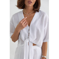 Жіночий літній костюм із брюками та блузкою на зав'язках  білий колір