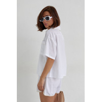 Літній костюм із шортами на зав'язках та сорочкою  молочний колір