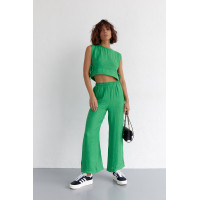 Літній жіночий костюм із брюками та топом із зав'язками  зелений колір