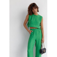 Літній жіночий костюм із брюками та топом із зав'язками  зелений колір