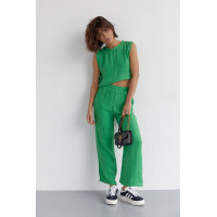 Літній жіночий костюм із брюками та топом із зав'язками  зелений колір