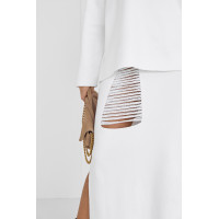 Жіночий спідничний костюм з оригінальним декором  молочний колір