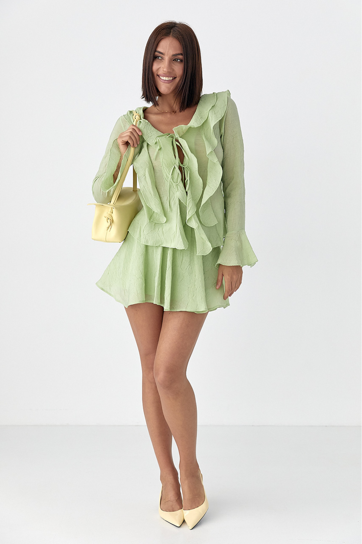 Літній костюм зі спідницею і блузою з рюшами  хакі колір