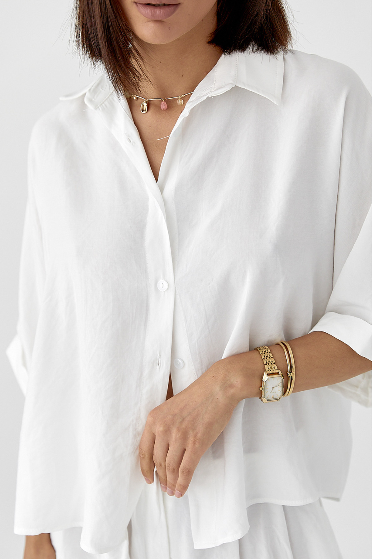 Костюм вільного крою із шортами та сорочкою  білий колір