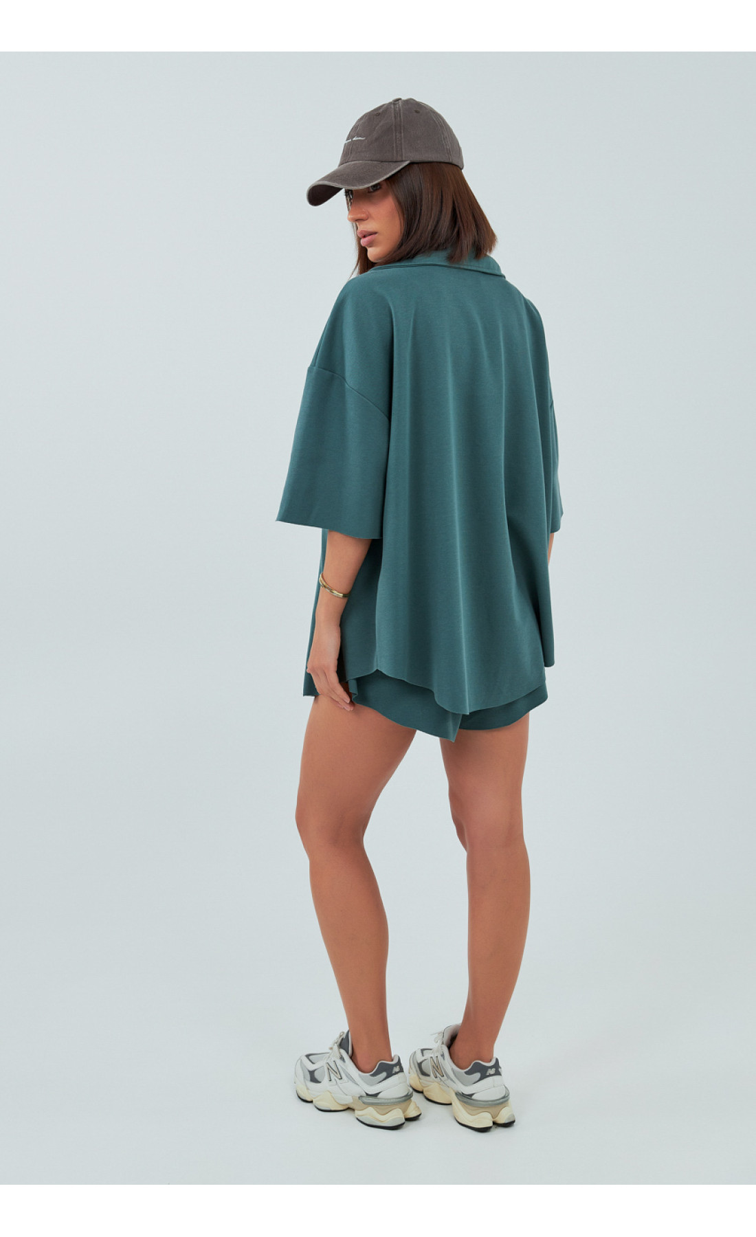 Трикотажний костюм із шортами та сорочкою  зелений колір