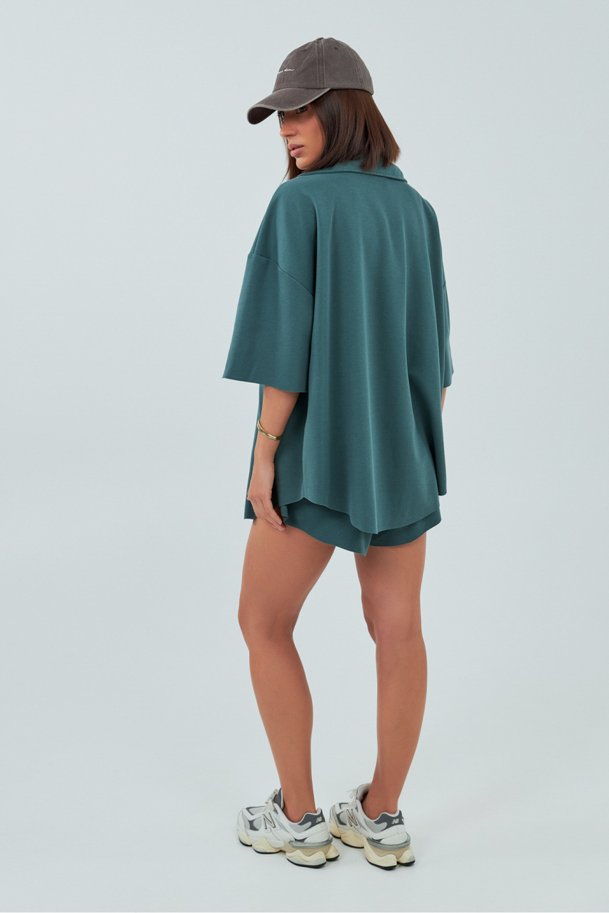 Трикотажний костюм із шортами та сорочкою  зелений колір