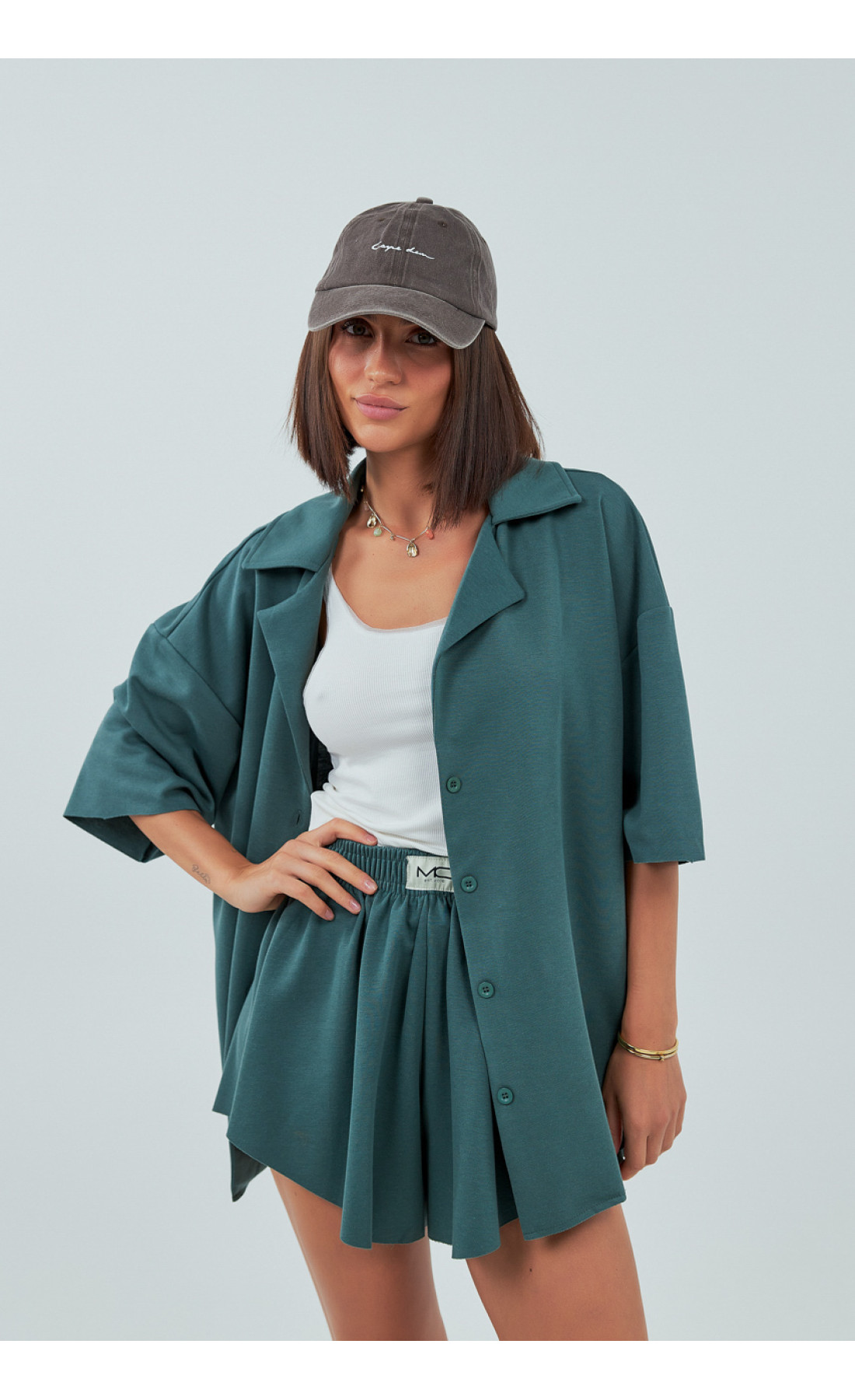 Трикотажний костюм із шортами та сорочкою  зелений колір