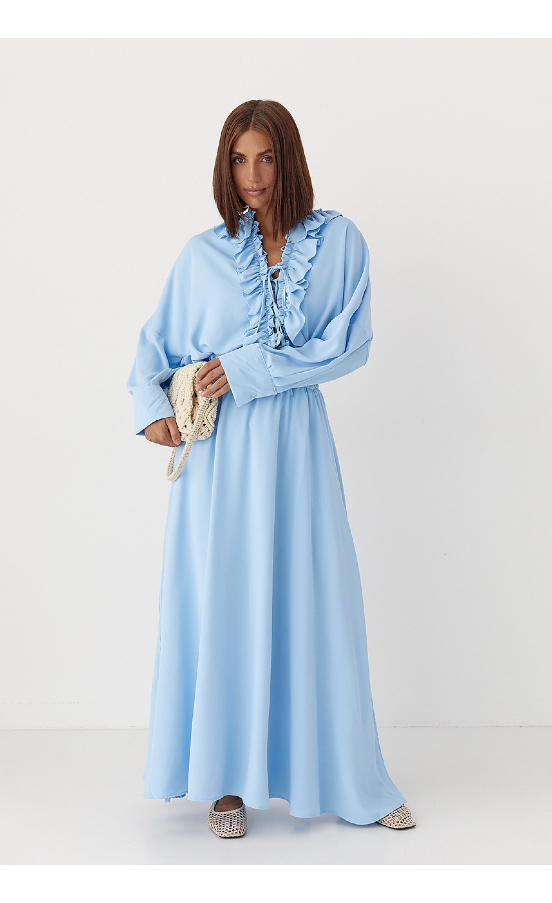 Костюм з рюшами зі спідниці та блузи  блакитний колір