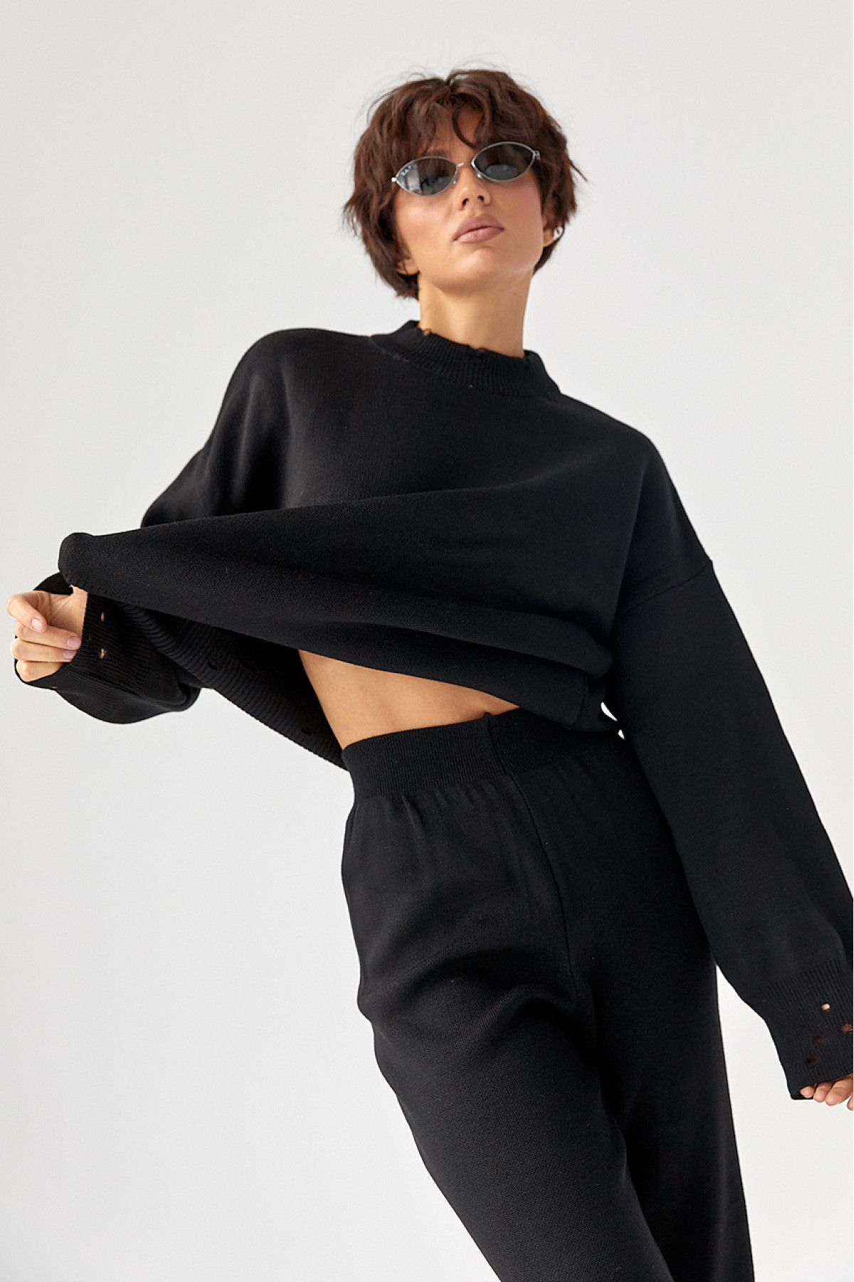 Трикотажний костюм з рваним ефектом  чорний колір