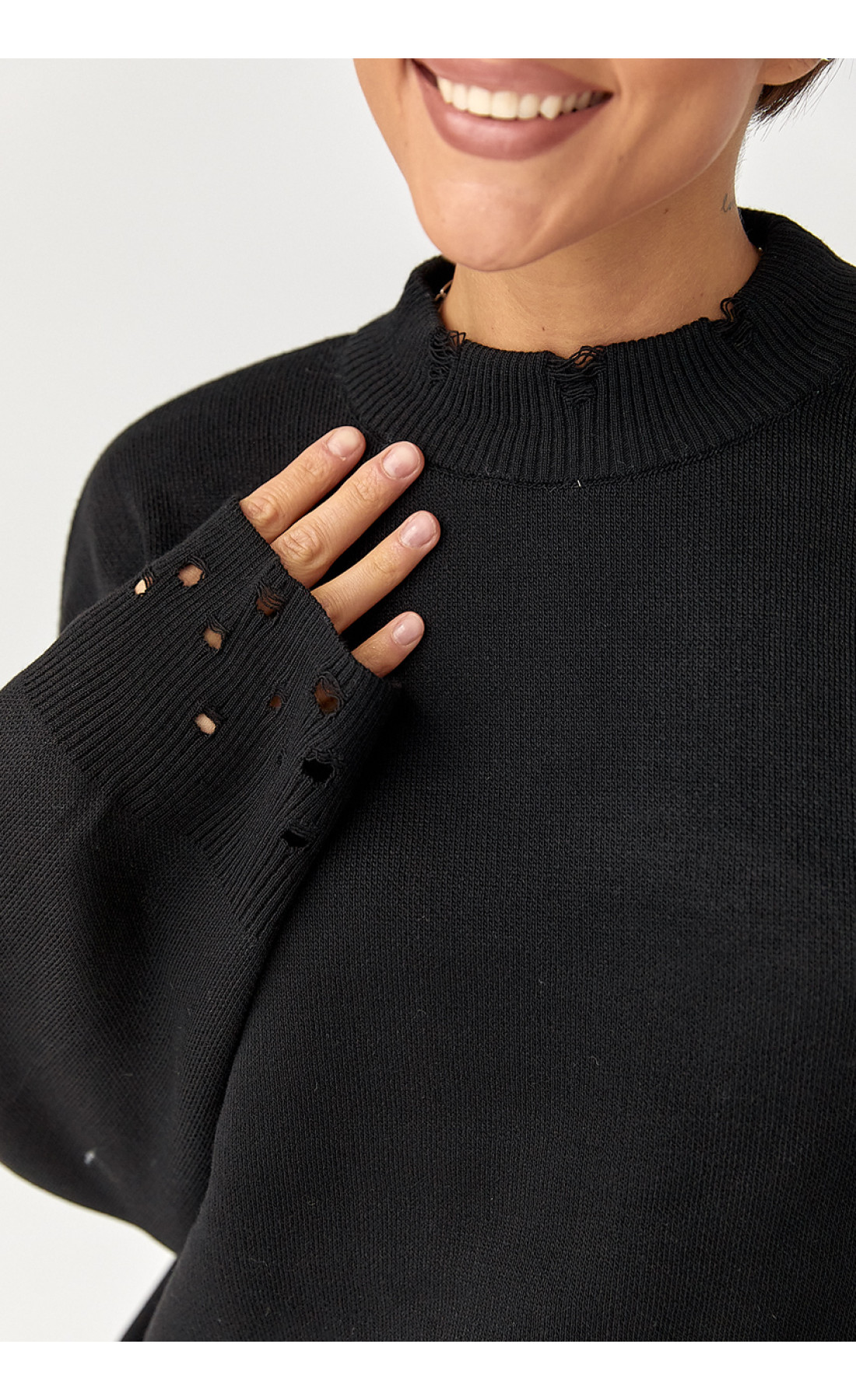 Трикотажний костюм з рваним ефектом  чорний колір