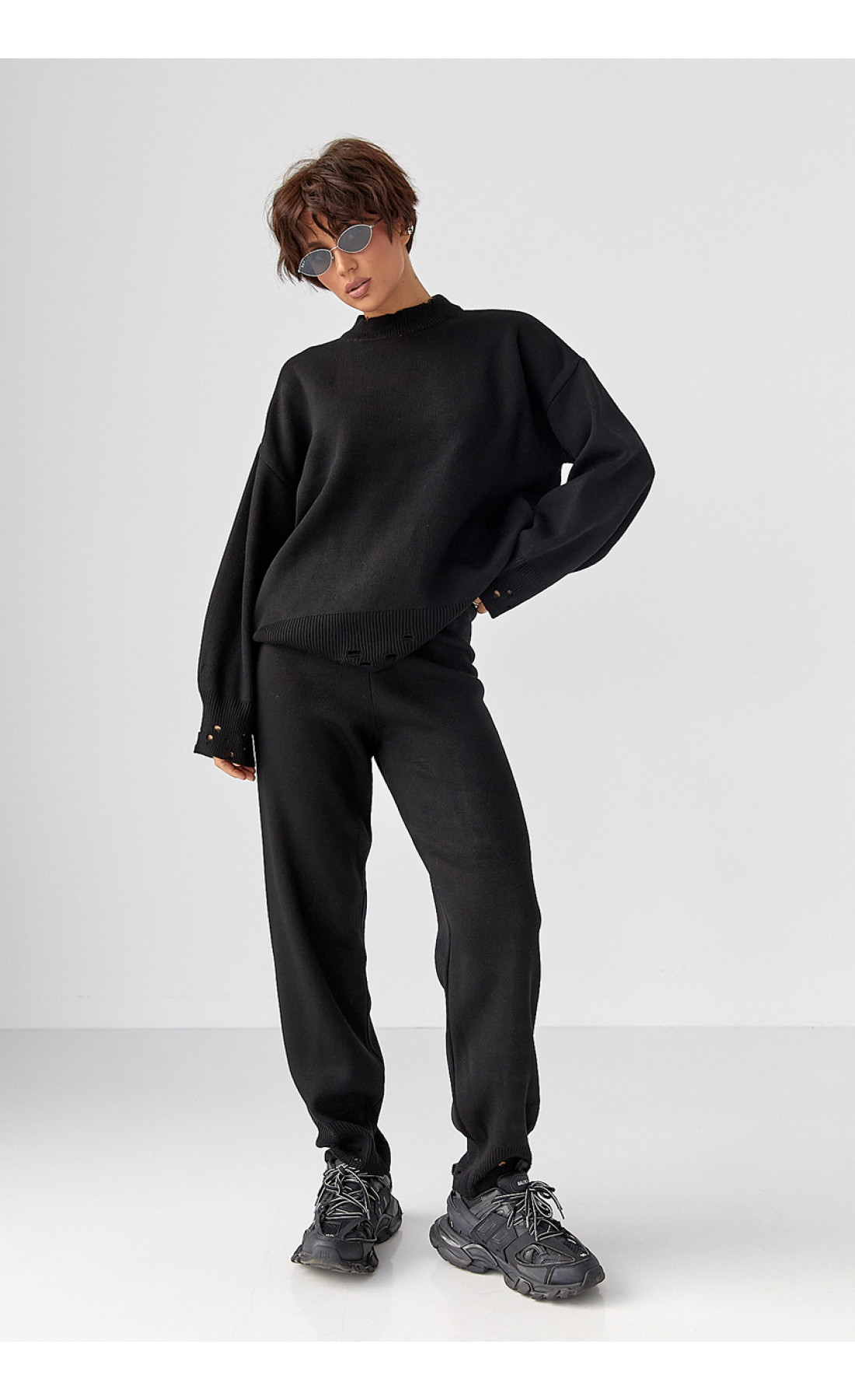 Трикотажний костюм з рваним ефектом  чорний колір