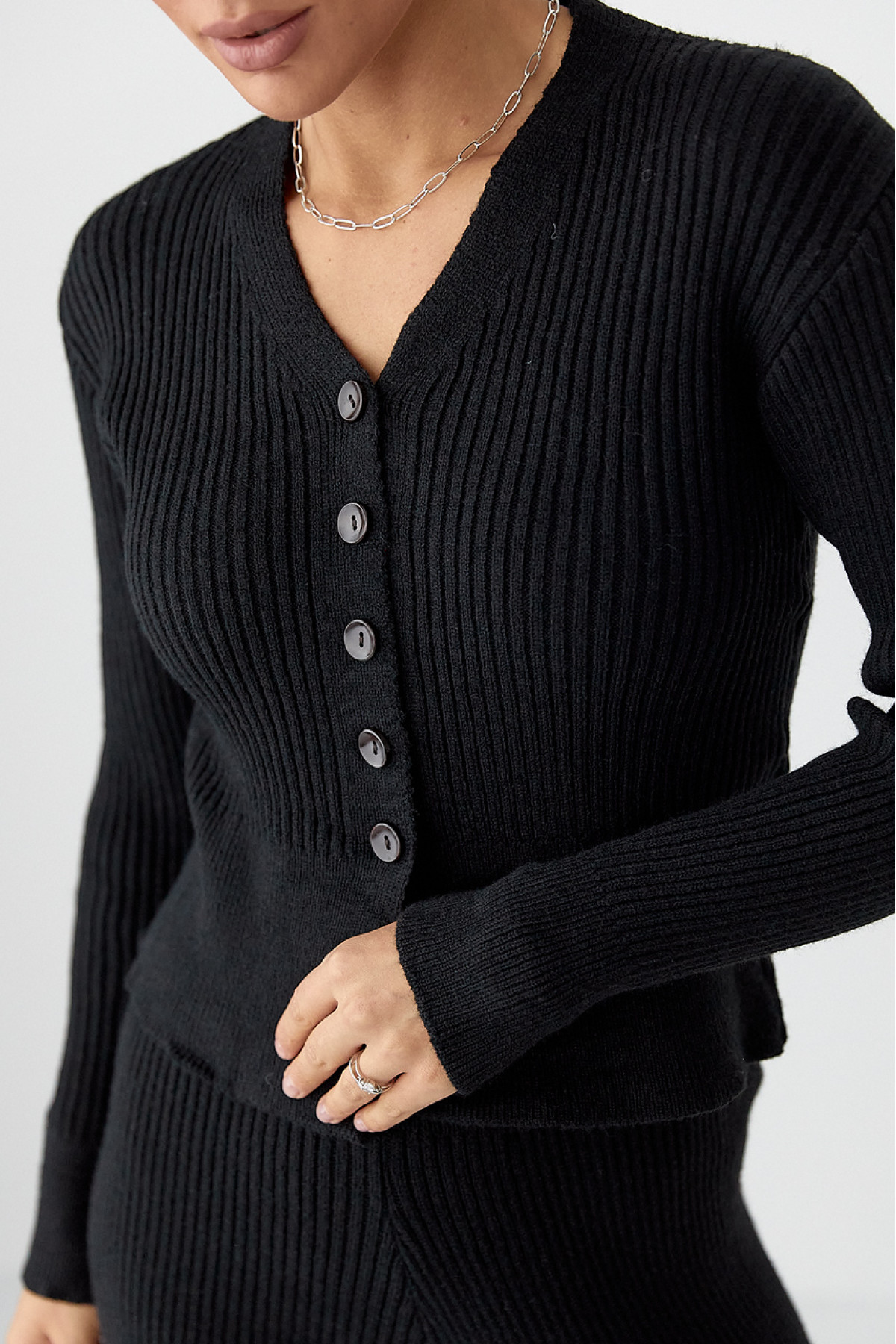 Трикотажний костюм у рубчик із кардиганом і штанами палаццо  чорний колір