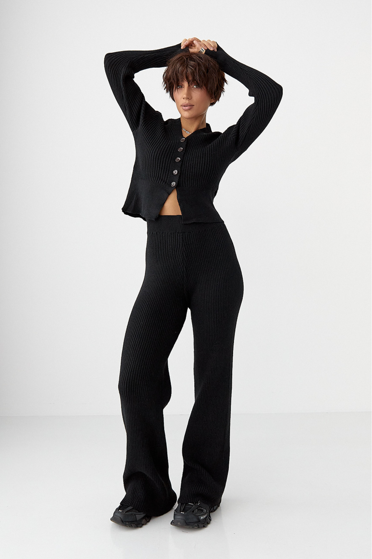 Трикотажний костюм у рубчик із кардиганом і штанами палаццо  чорний колір