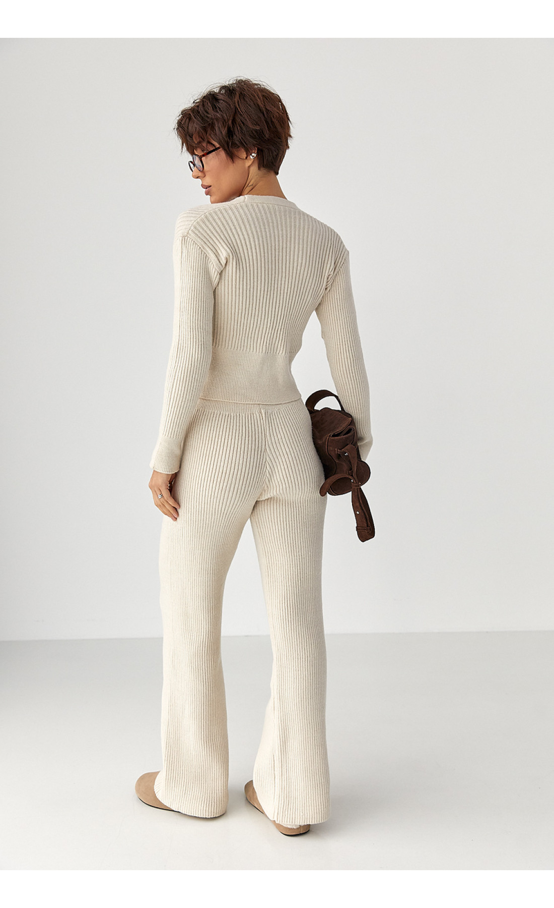 Трикотажний костюм у рубчик із кардиганом і штанами палаццо  молочний колір