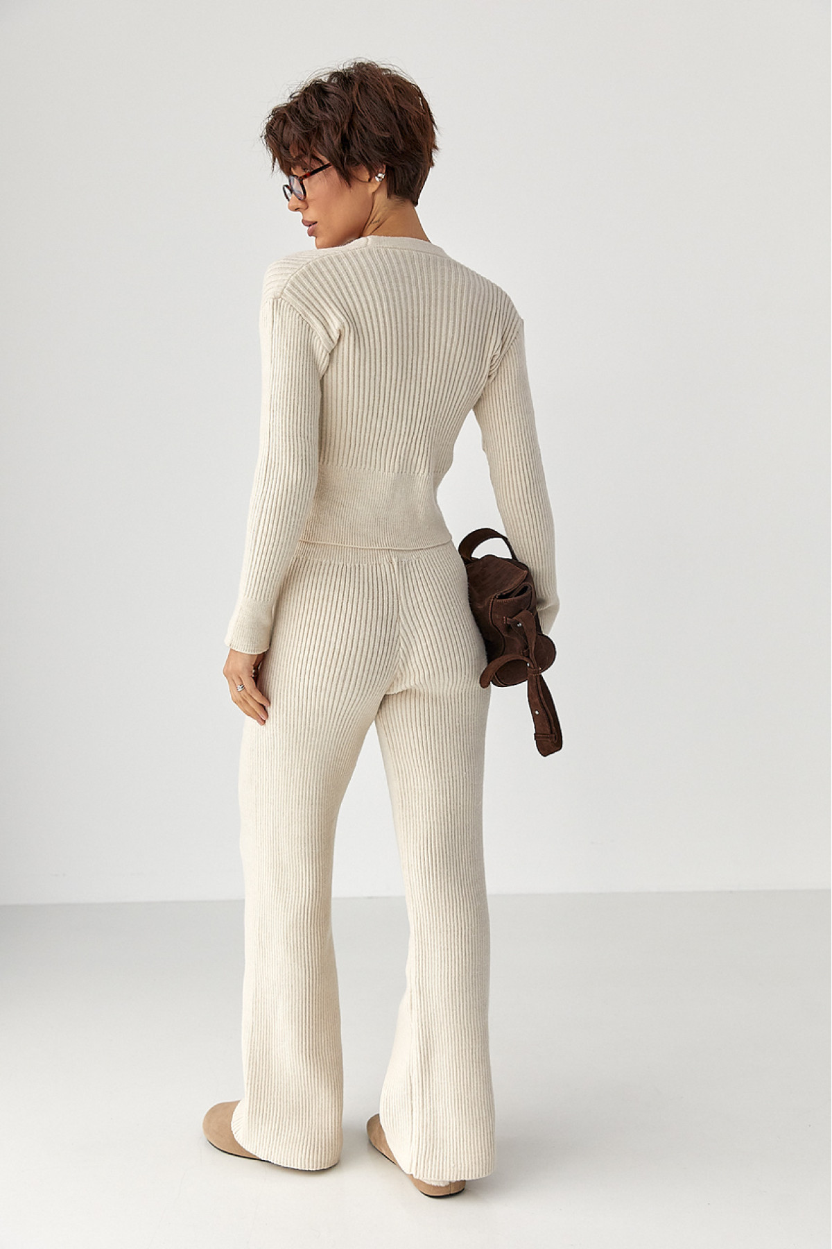 Трикотажний костюм у рубчик із кардиганом і штанами палаццо  молочний колір