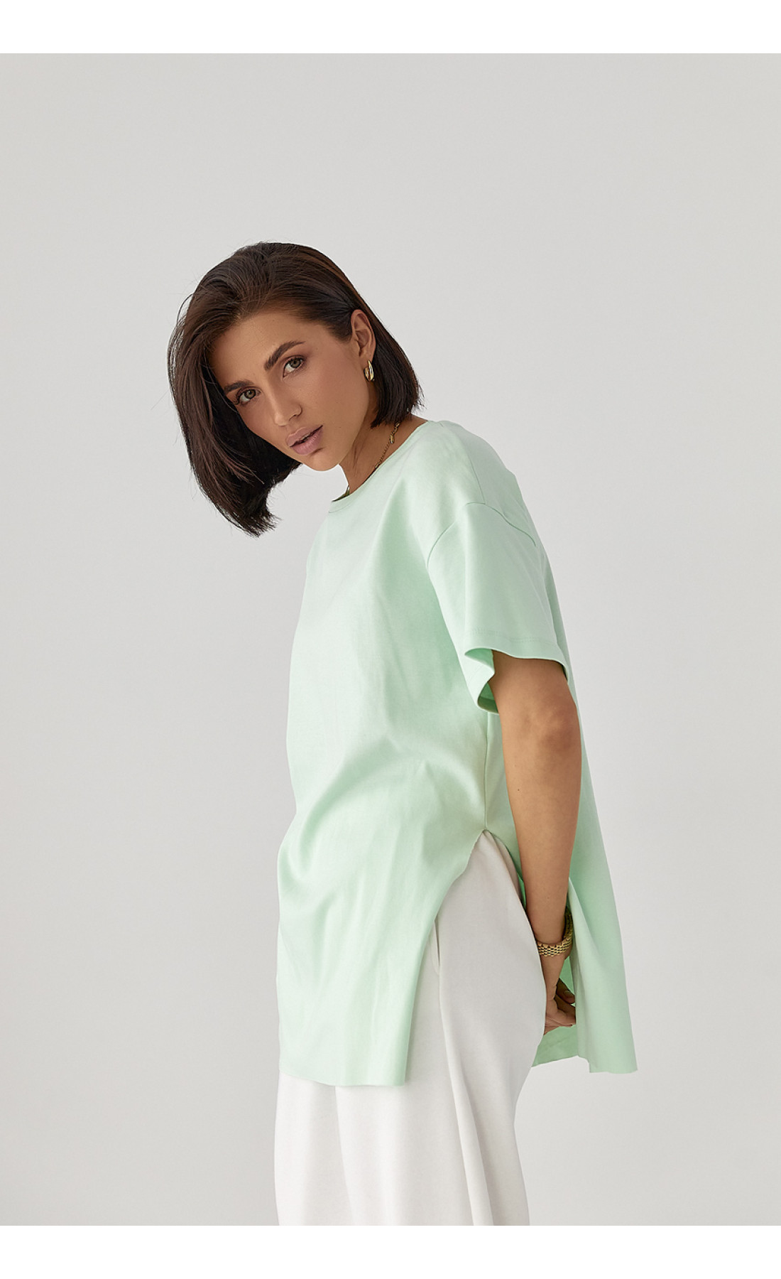 Однотонна футболка з розрізами  м'ятний колір