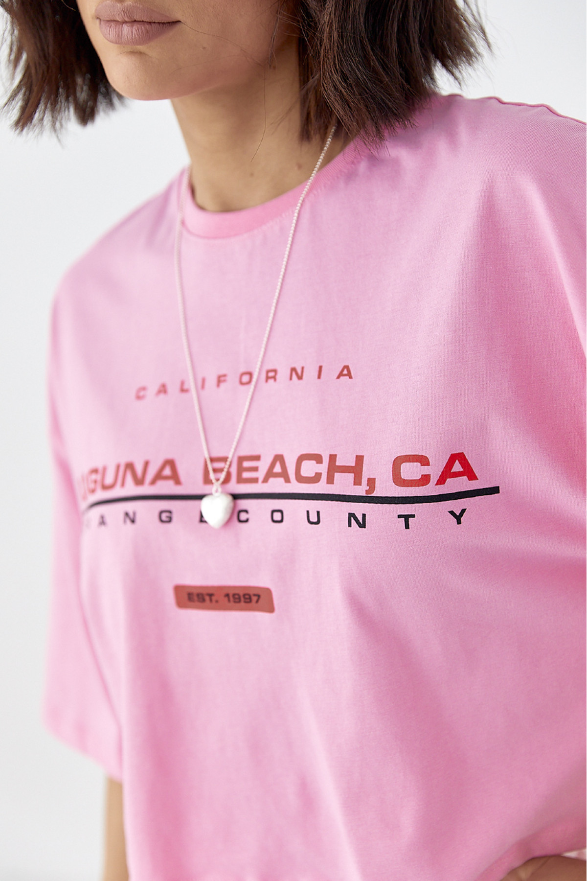 Укорочена футболка вільного крою  рожевий колір