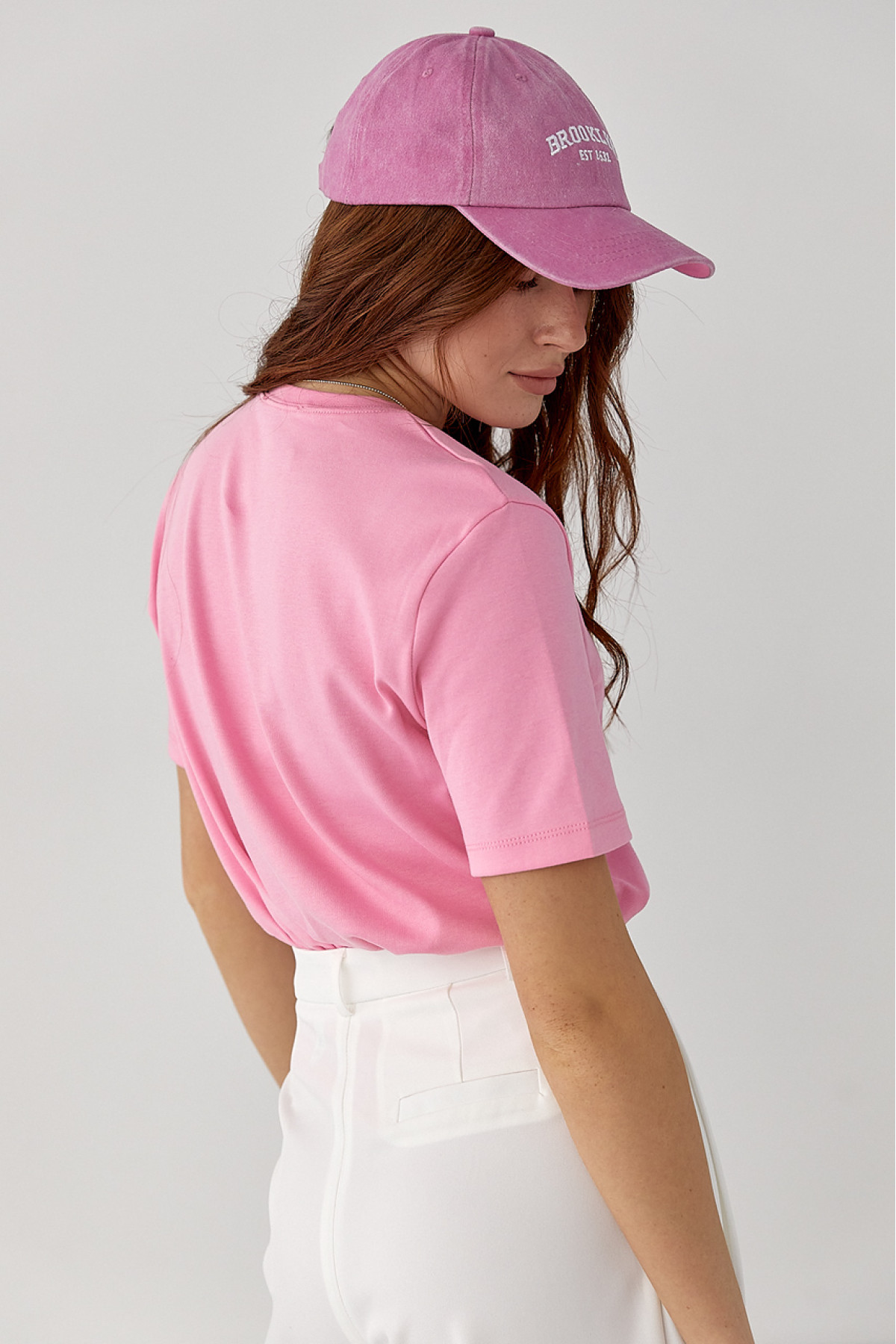 Футболка з написом і бантами  рожевий колір