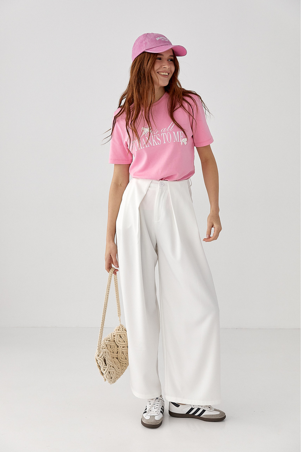 Футболка з написом і бантами  рожевий колір