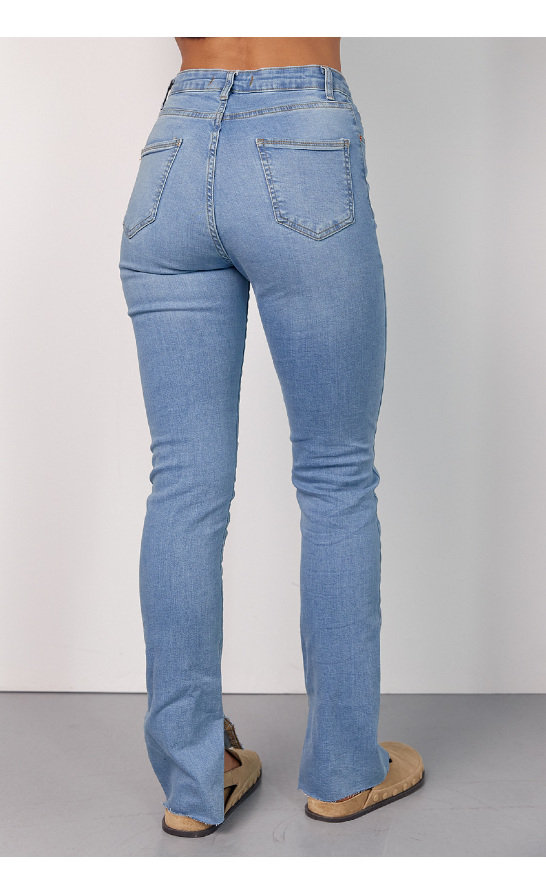 Жіночі жіночі джинси skinny з розрізами  блакитний колір