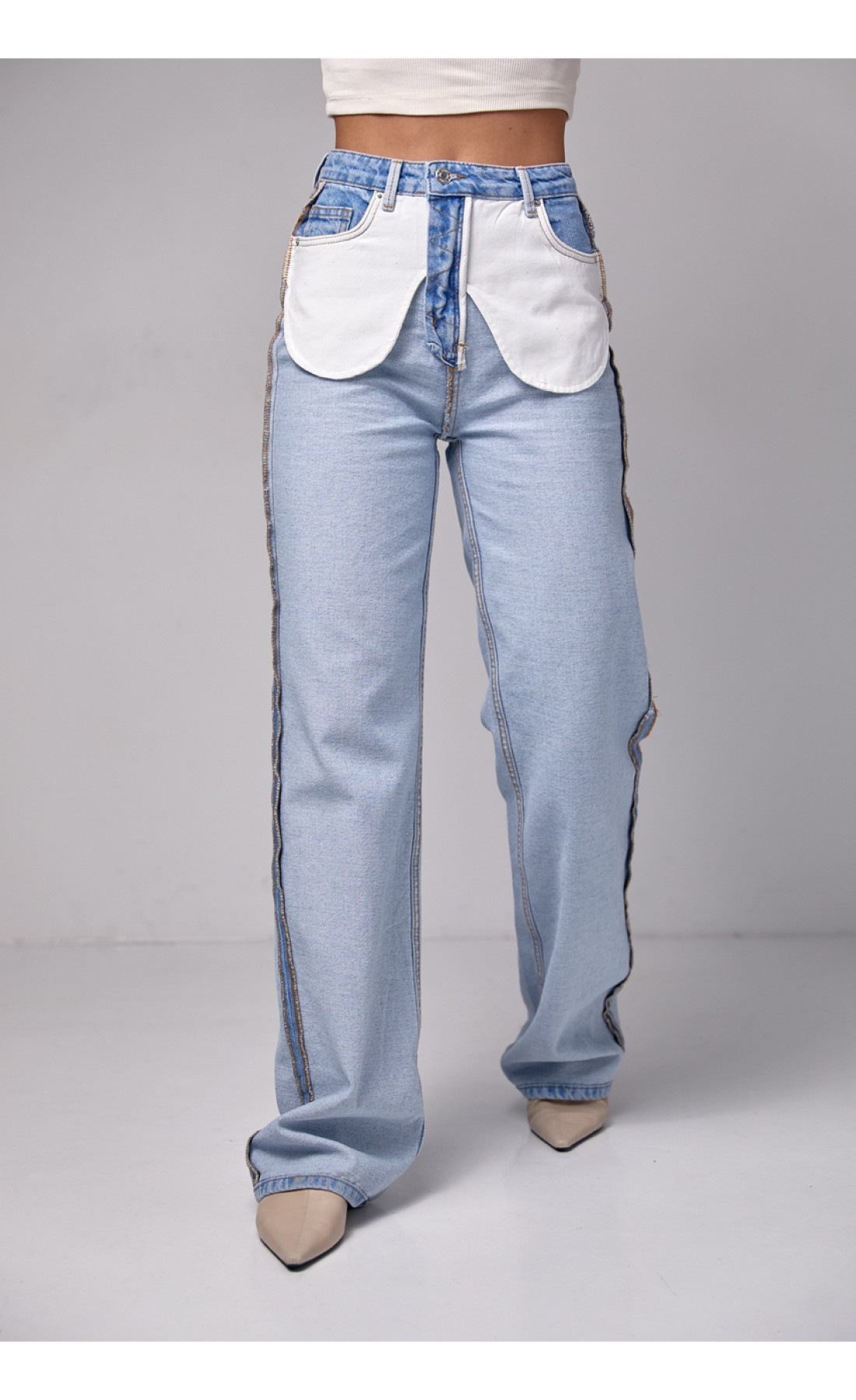 Жіночі жіночі джинси з ефектом навиворіт  блакитний колір