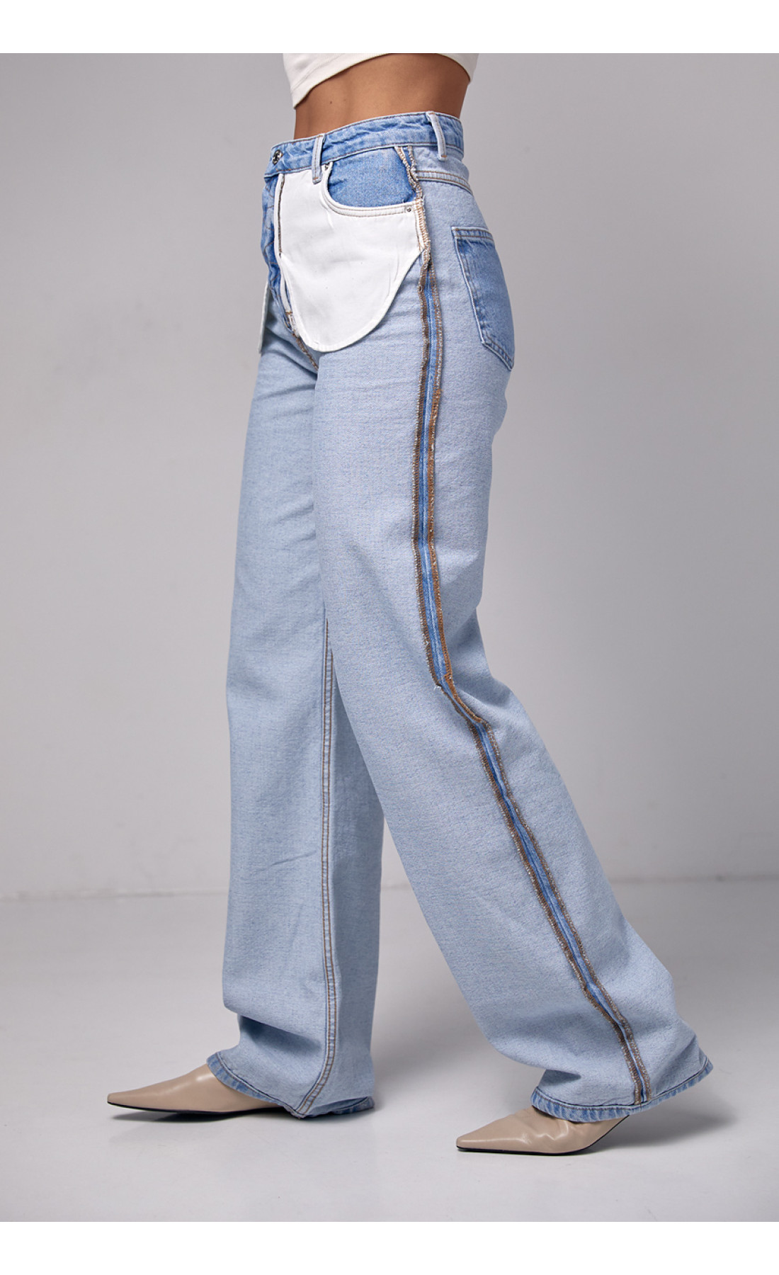 Жіночі жіночі джинси з ефектом навиворіт  блакитний колір