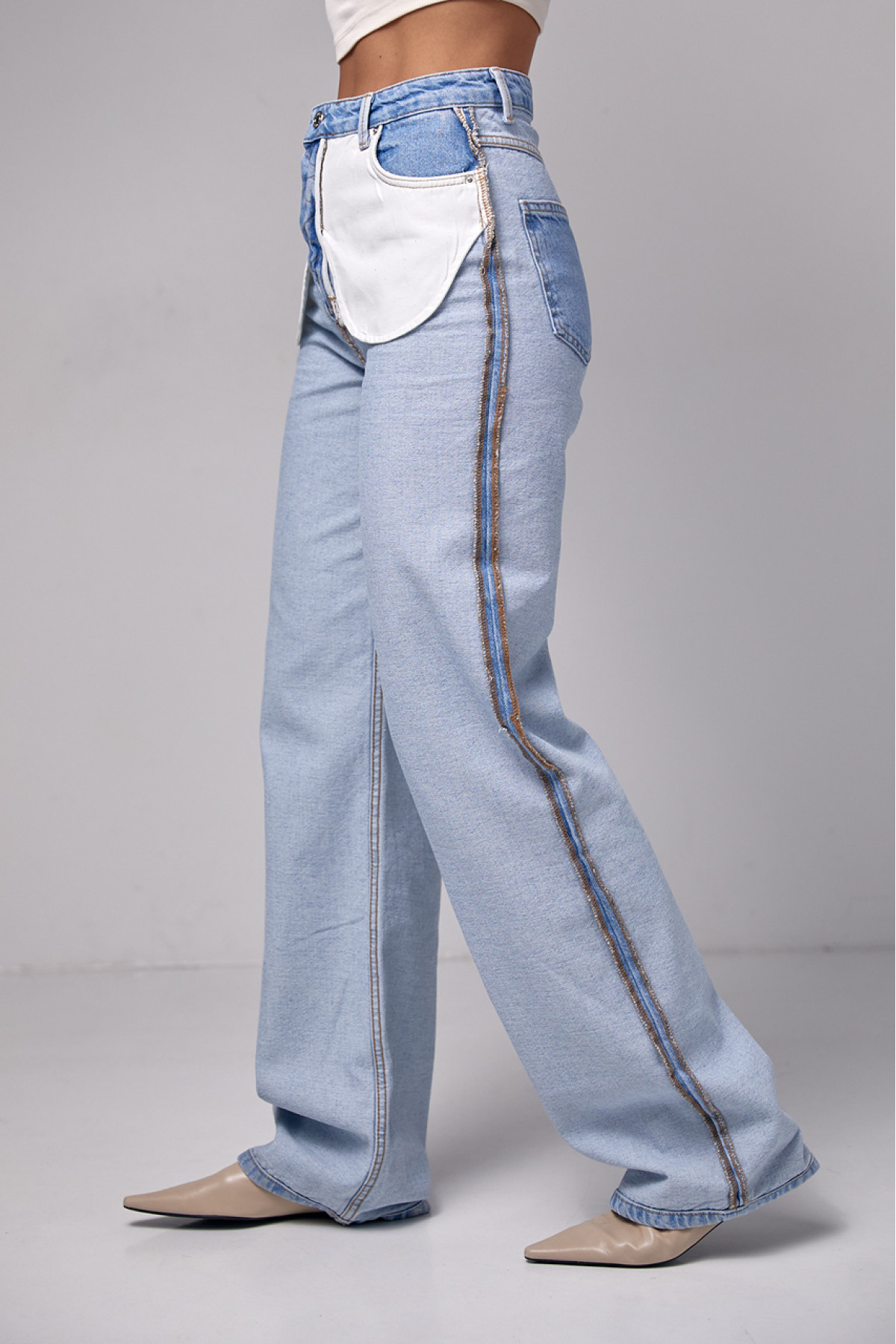 Жіночі жіночі джинси з ефектом навиворіт  блакитний колір