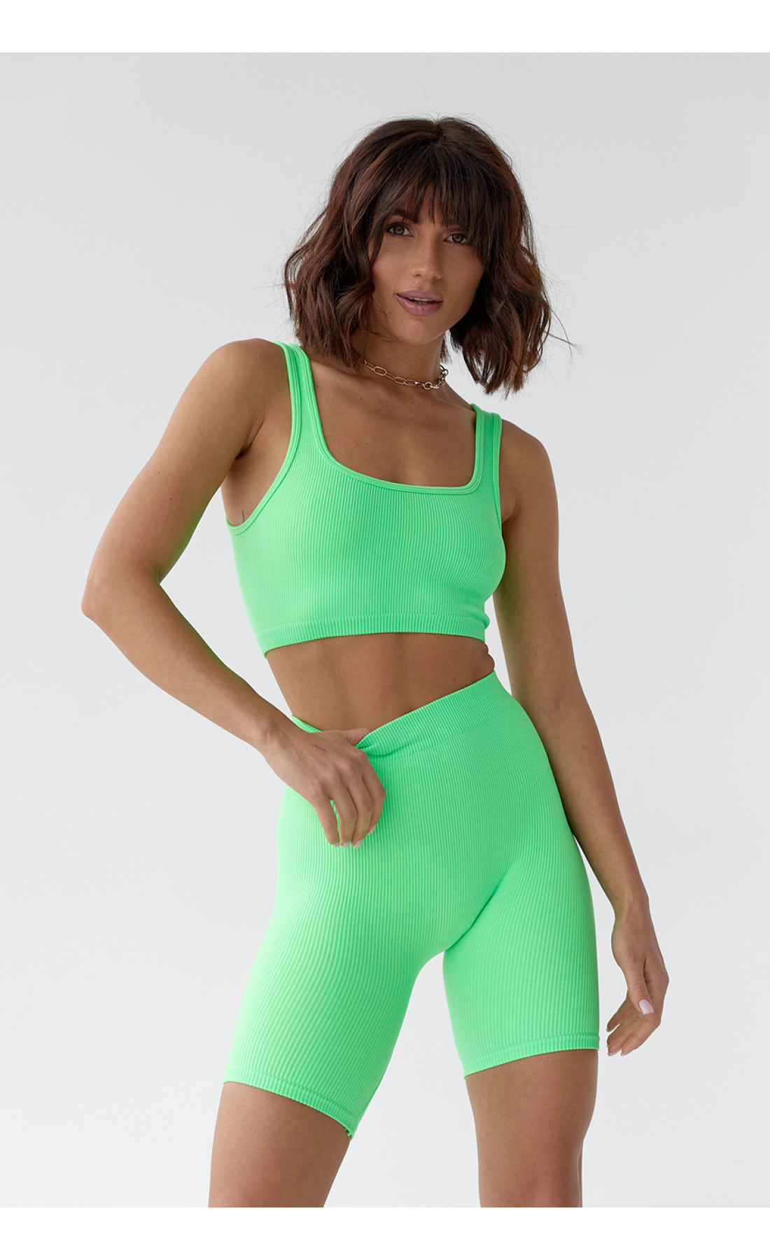Жіночий еластичний костюм з велосипедками і топом  салатовий колір