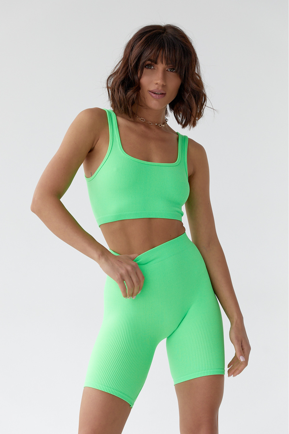 Жіночий еластичний костюм з велосипедками і топом  салатовий колір