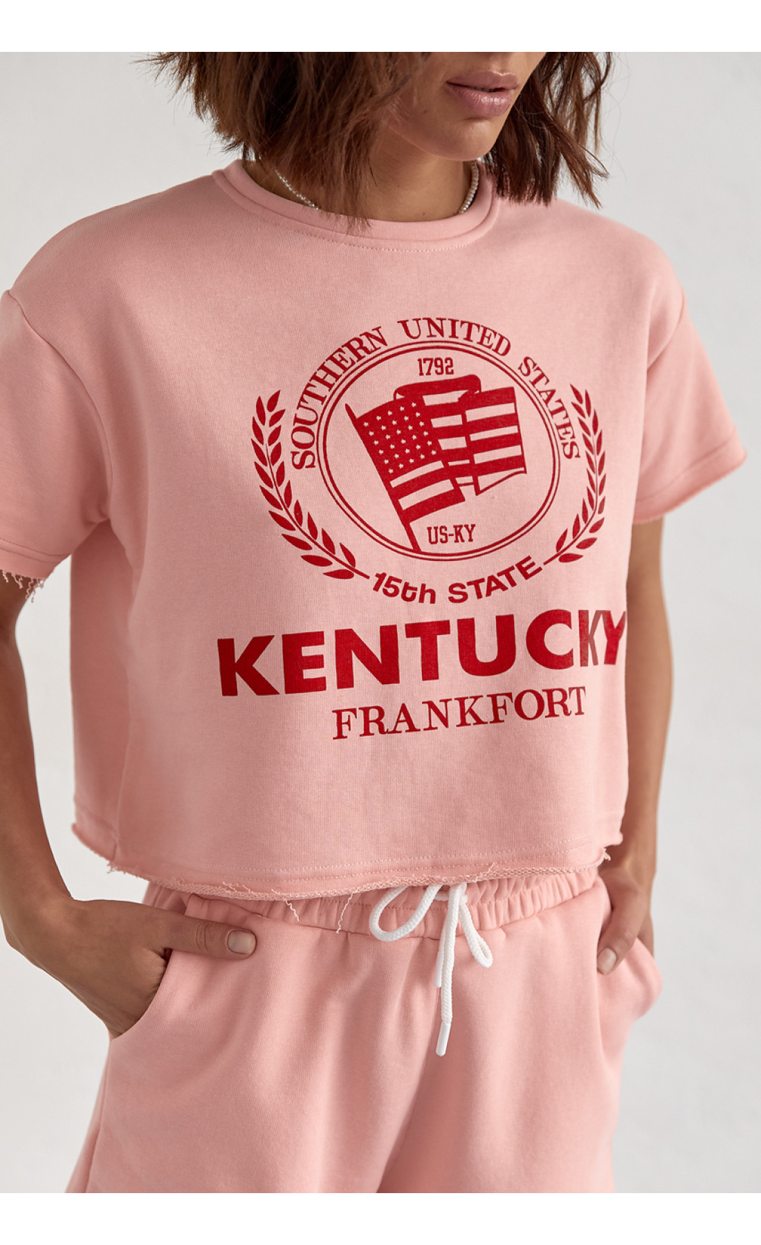 Жіночий спортивний комплект із шортами та футболкою  пудра колір