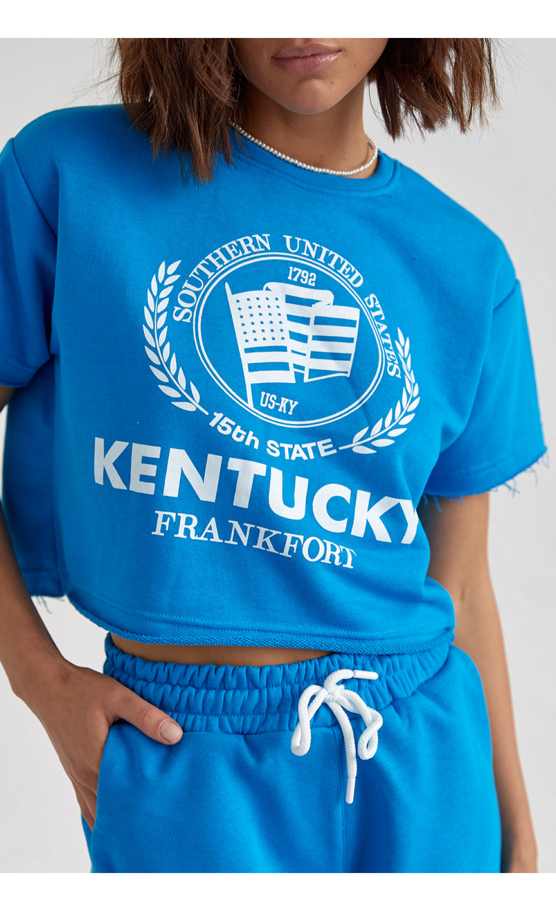 Жіночий спортивний комплект із шортами та футболкою  синій колір