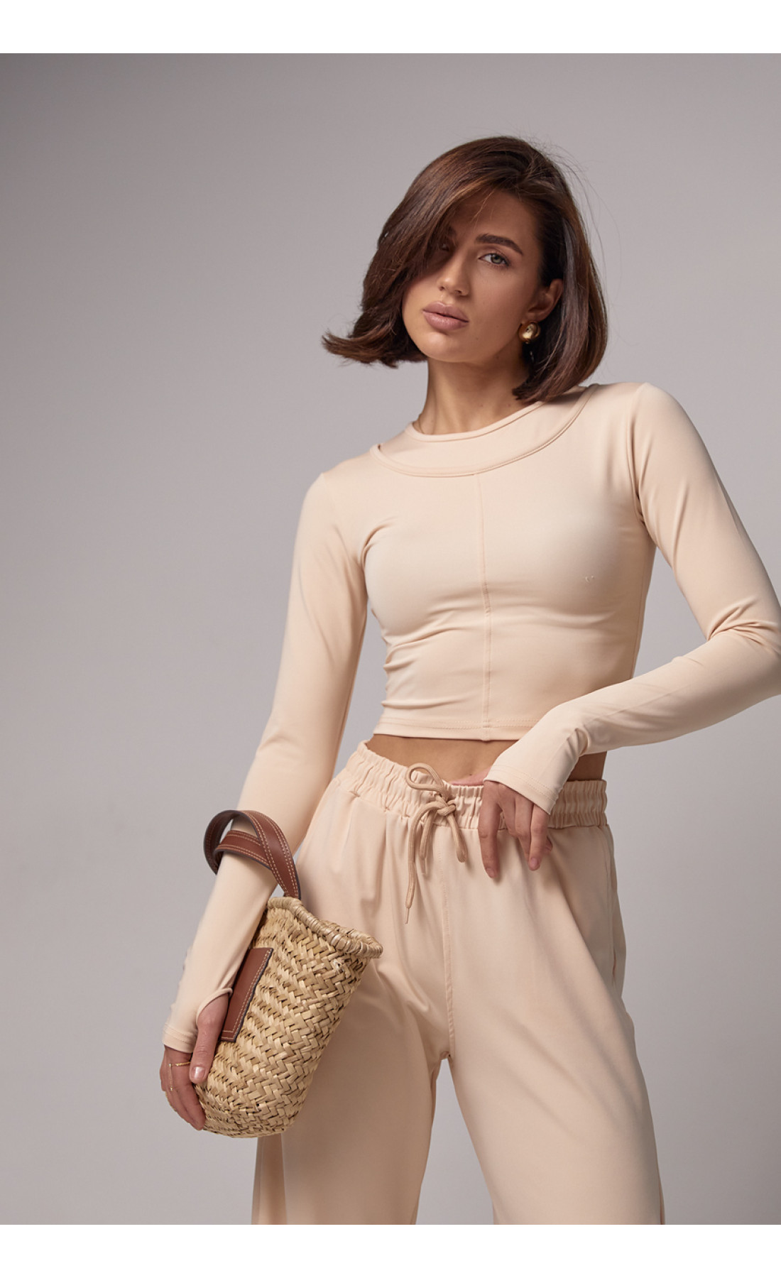 Еластичний жіночий спортивний костюм  бежевий колір