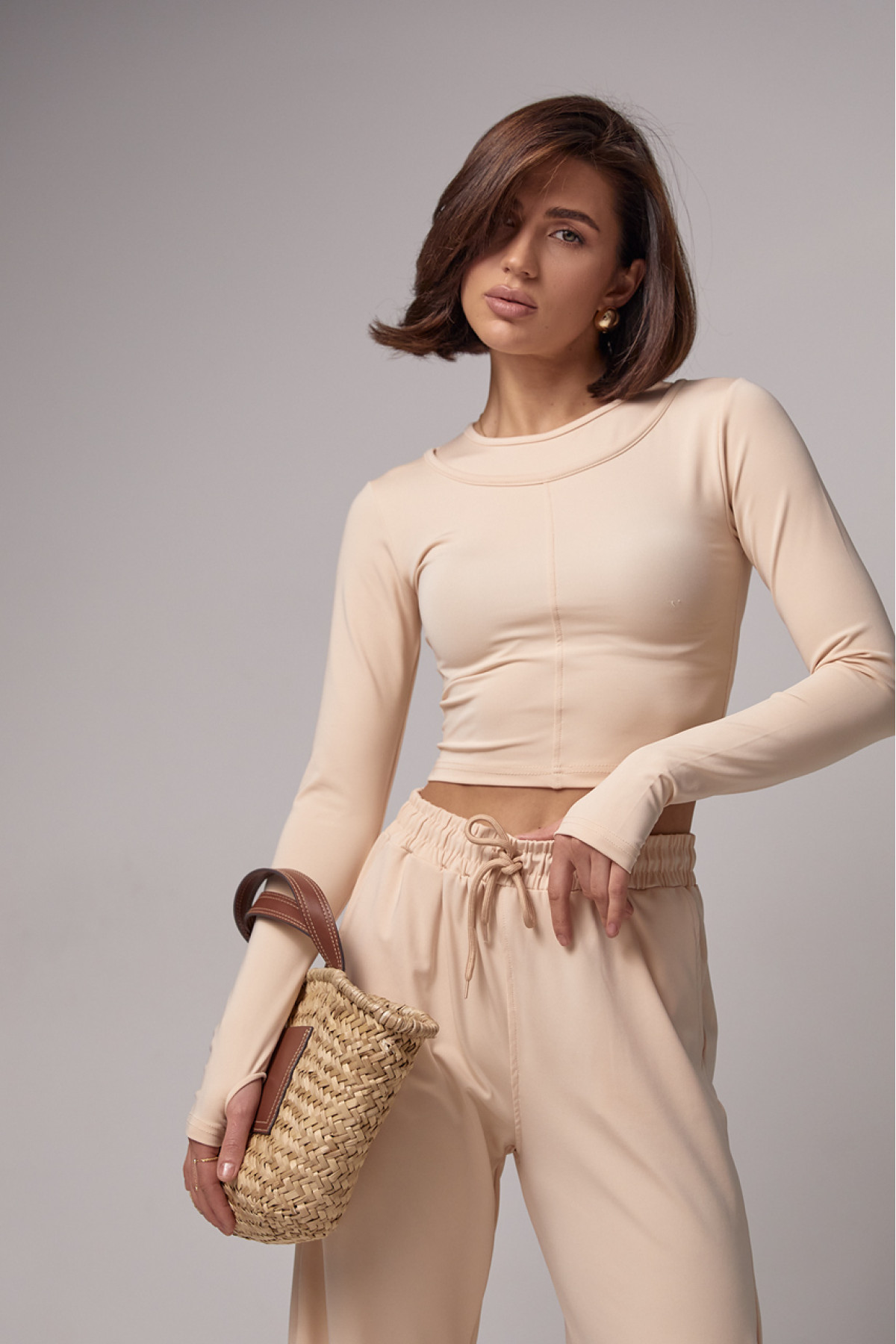 Еластичний жіночий спортивний костюм  бежевий колір