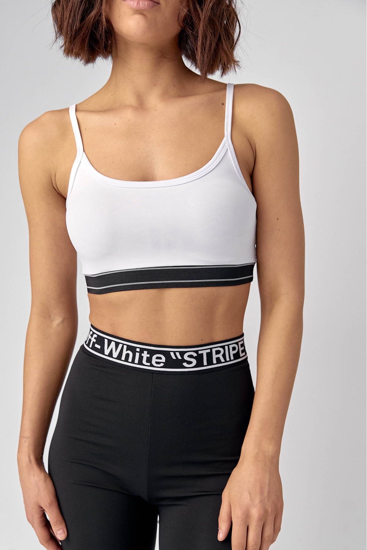 Жіночий костюм з велосипедними шортами та топом  чорний колір