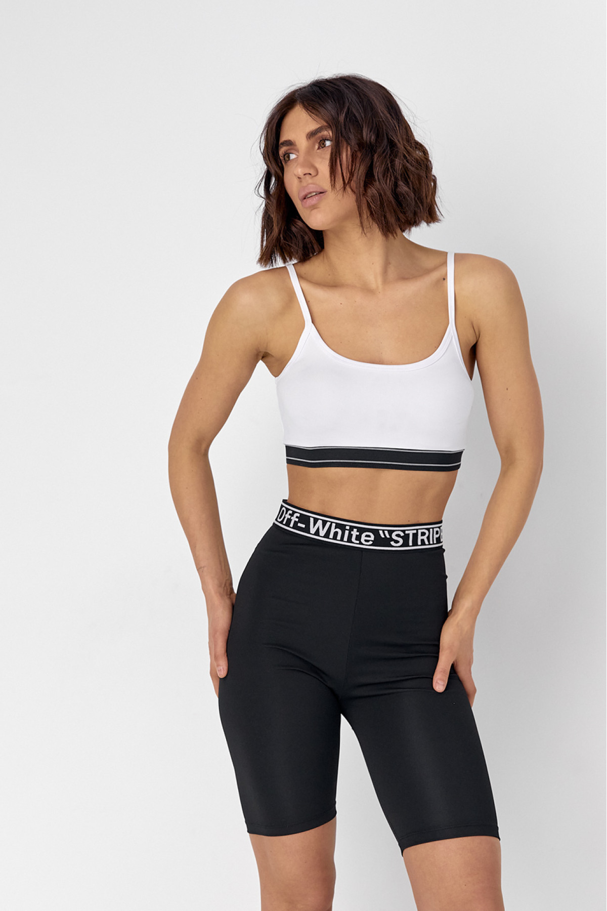 Жіночий костюм з велосипедними шортами та топом  чорний колір