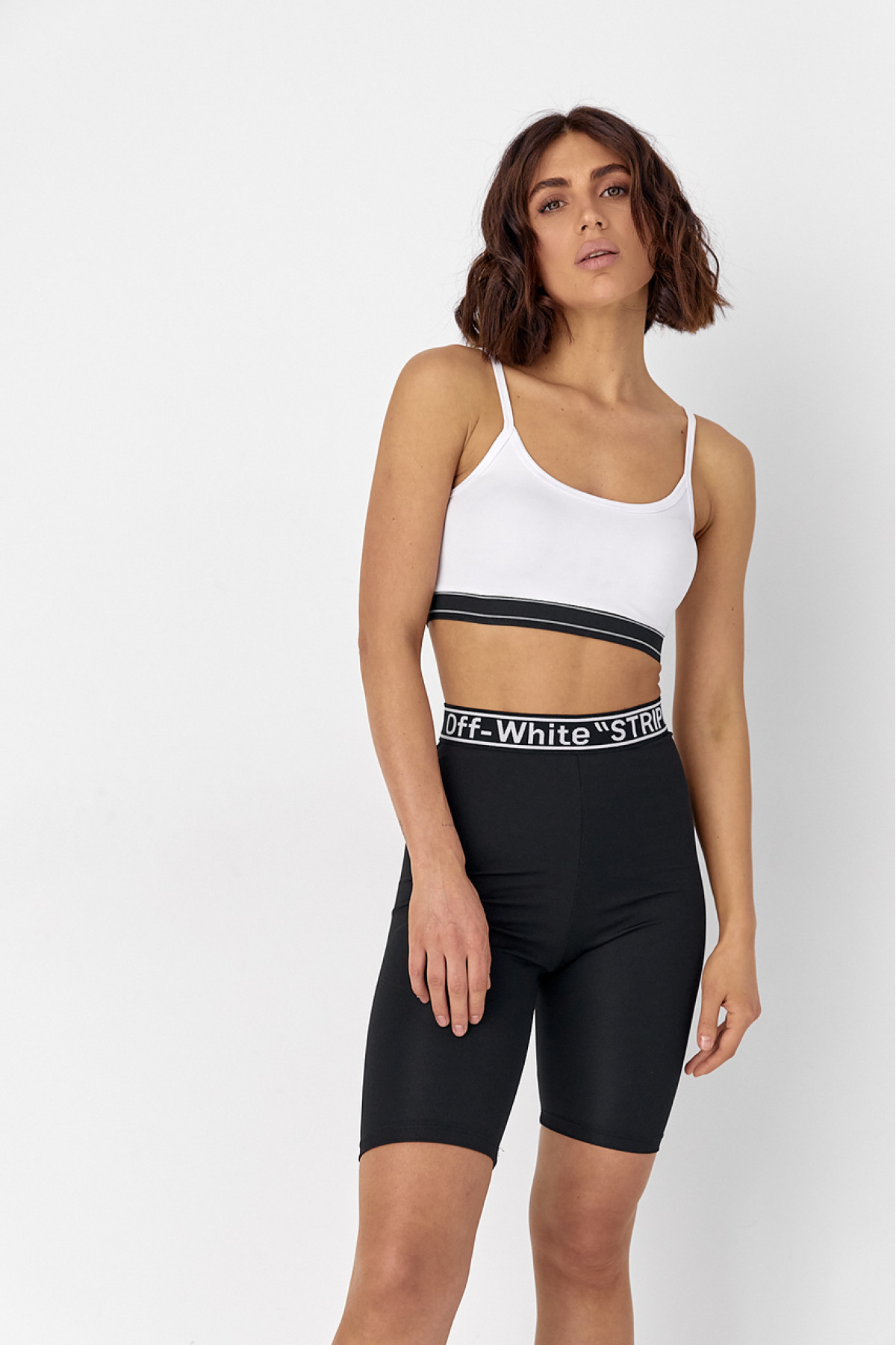 Жіночий костюм з велосипедними шортами та топом  чорний колір