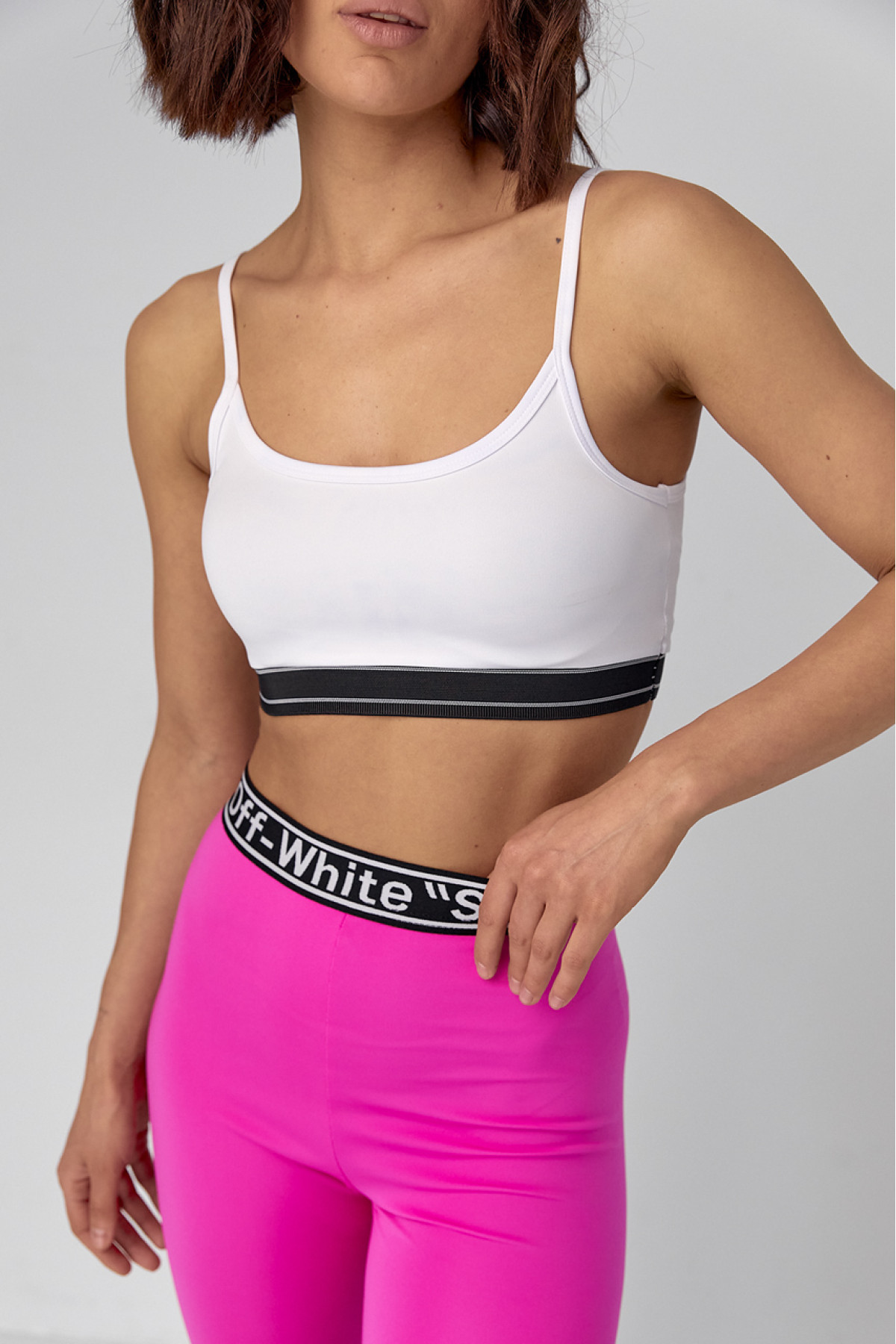 Жіночий костюм з велосипедними шортами та топом  фуксія колір