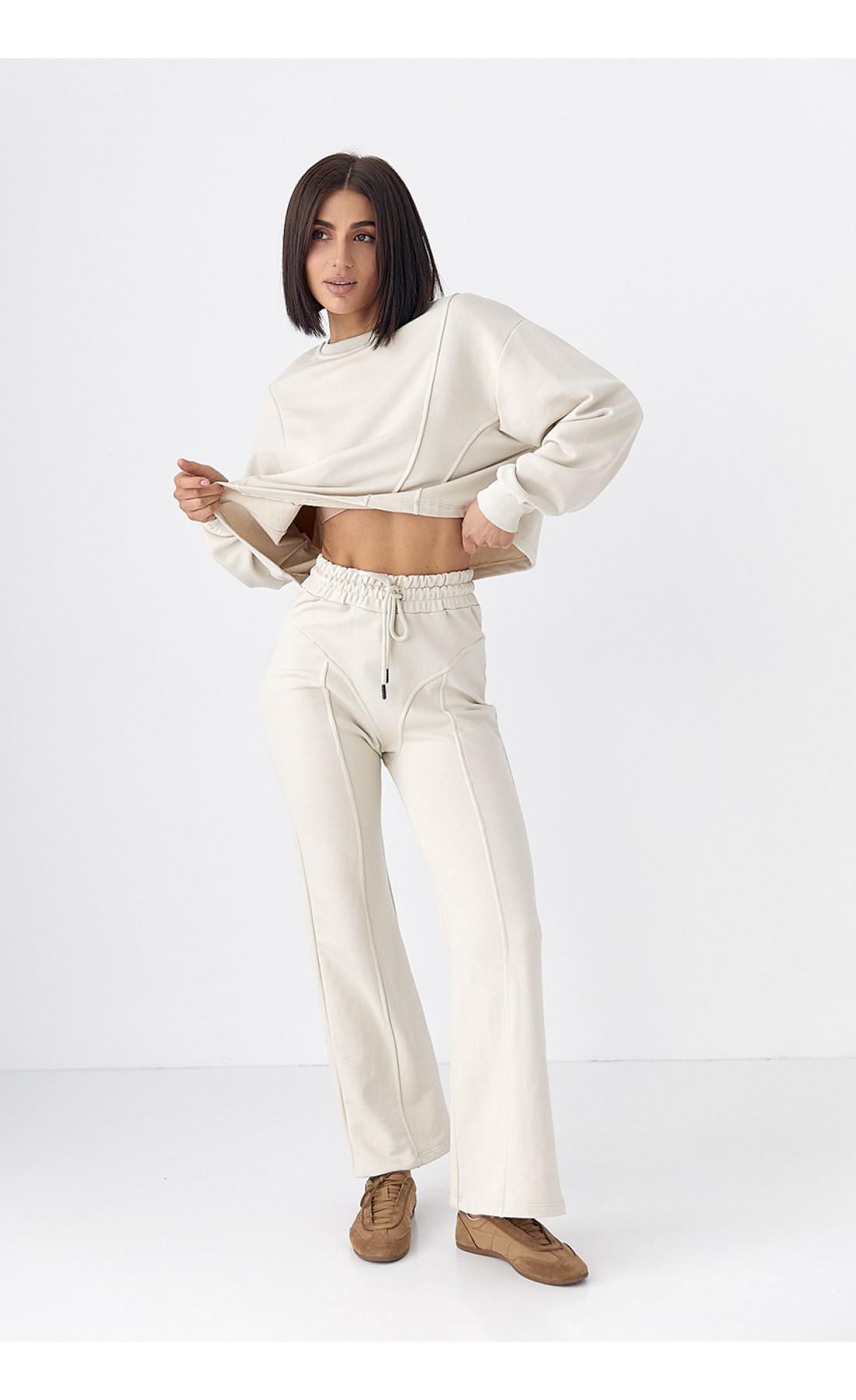 Спортивний костюм жіночий з акцентними швами  бежевий колір